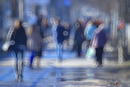 Crowd seen through blurry vision