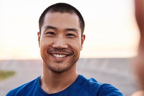 Young man smiling selfie